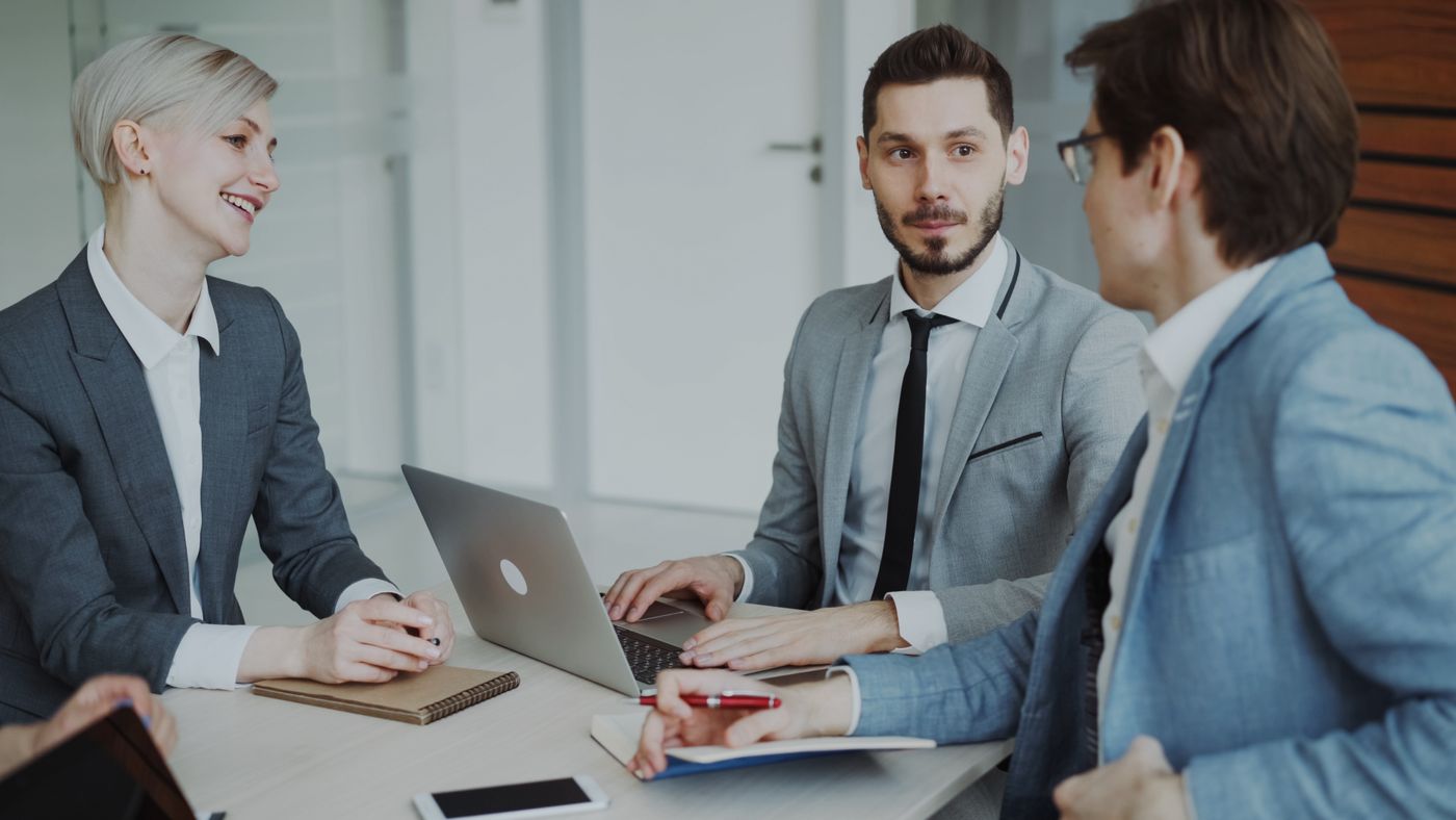 HR team reviewing a job candidate in a modern office